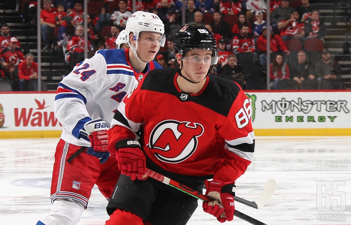 NEWARK, NEW JERSEY - OCTOBER 17: Kaapo Kakko #24 of the New York Rangers skates against Jack Hughes #86 of the New Jersey Devils during the second period at the Prudential Center on October 17, 2019 in Newark, New Jersey. (Photo by Bruce Bennett/Getty Ima