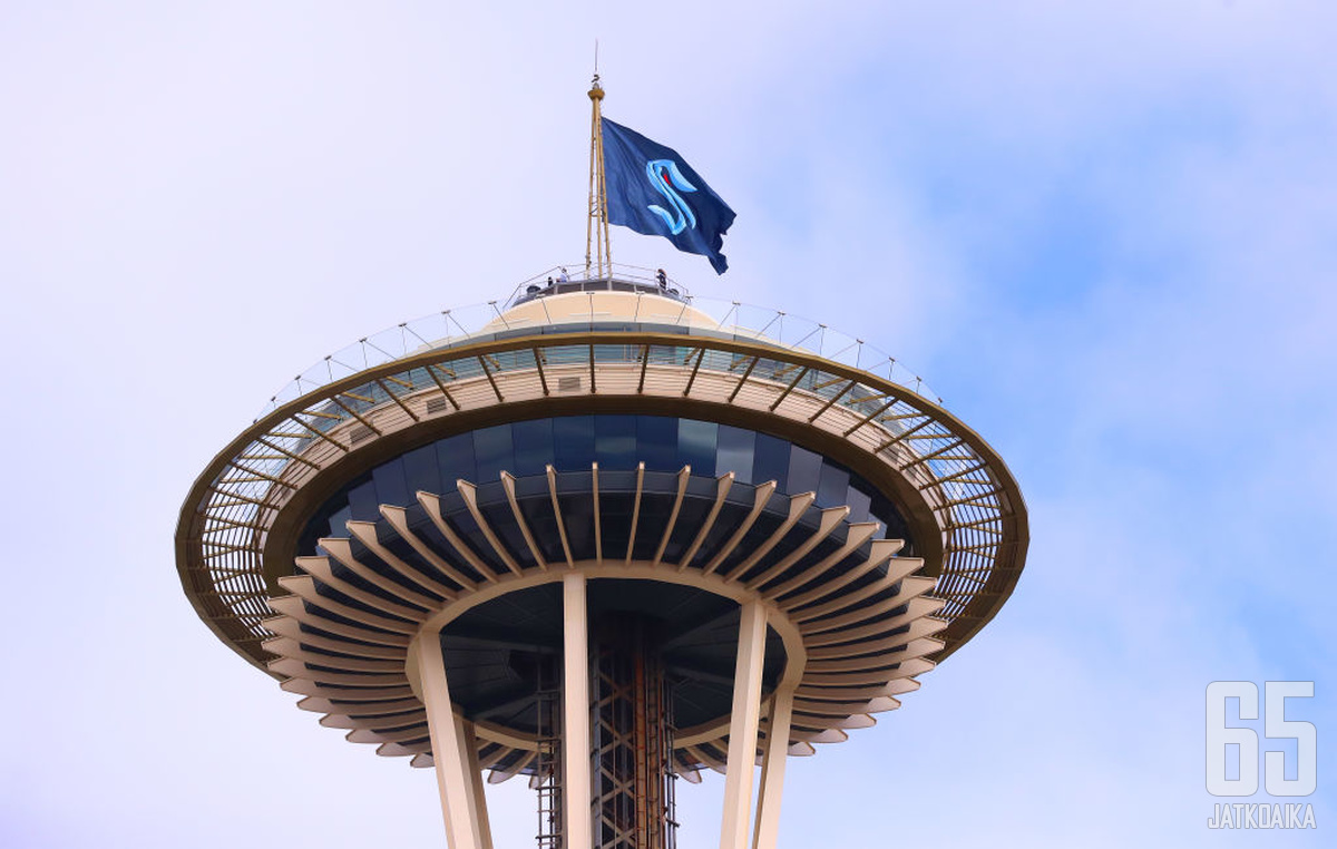 SEATTLE, WASHINGTON - JULY 23: A general view of the Space Needle as the Seattle Kraken team flag is hung from above on July 23, 2020 in Seattle, Washington. The NHL revealed the franchise's new team name today.  (Photo by Abbie Parr/Getty Images)