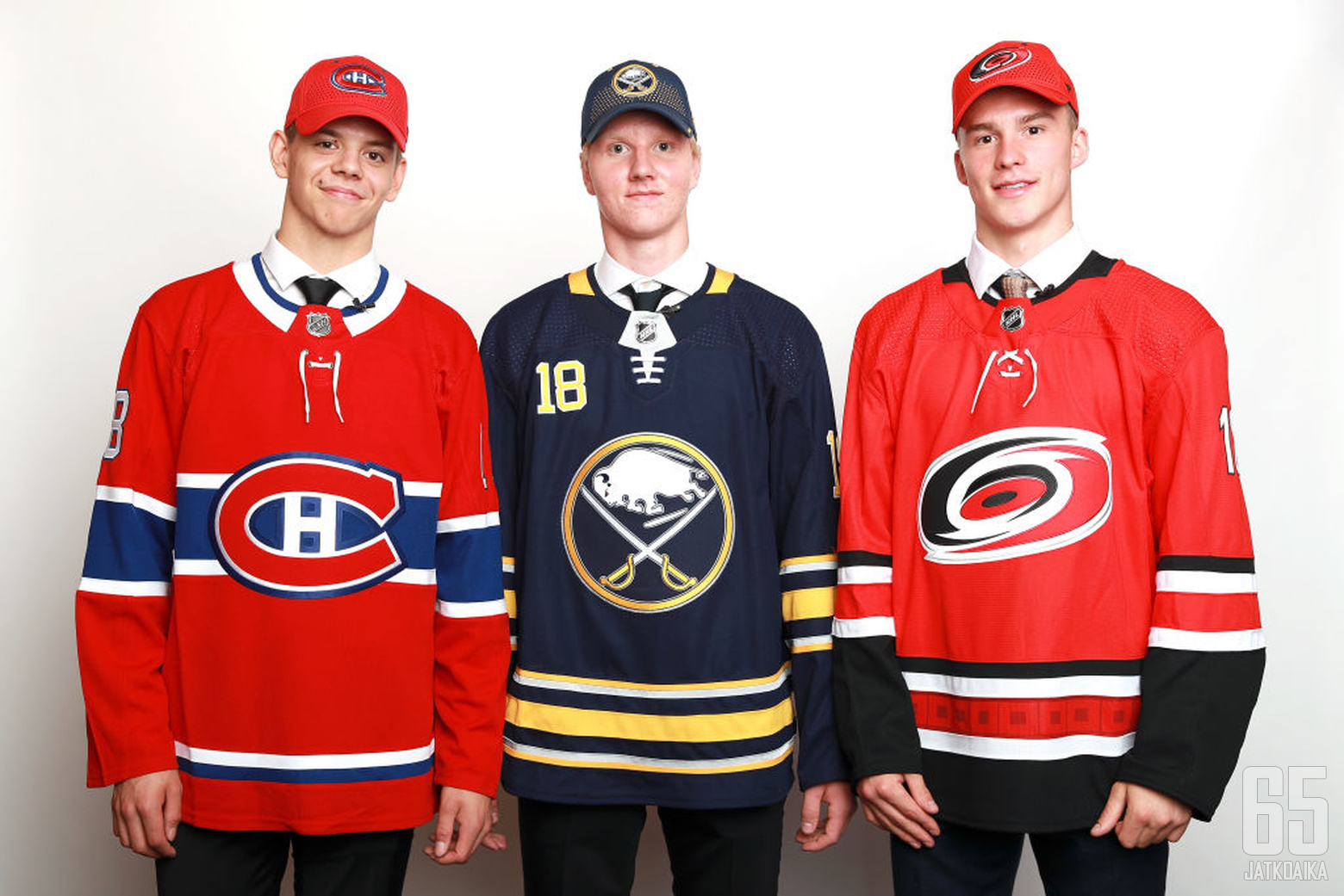 DALLAS, TX - JUNE 22:  (left to right) Jesperi Kotkaniemi, who was selected third overall by the Montreal Canadiens, Rasmus Dahlin, who was selected first overall by the Buffalo Sabres, and Andrei Svechnikov, who was selected second overall by the Carolin
